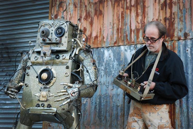 Robot 42 and his creator Chris Spollen. Photo © Chris Spollen